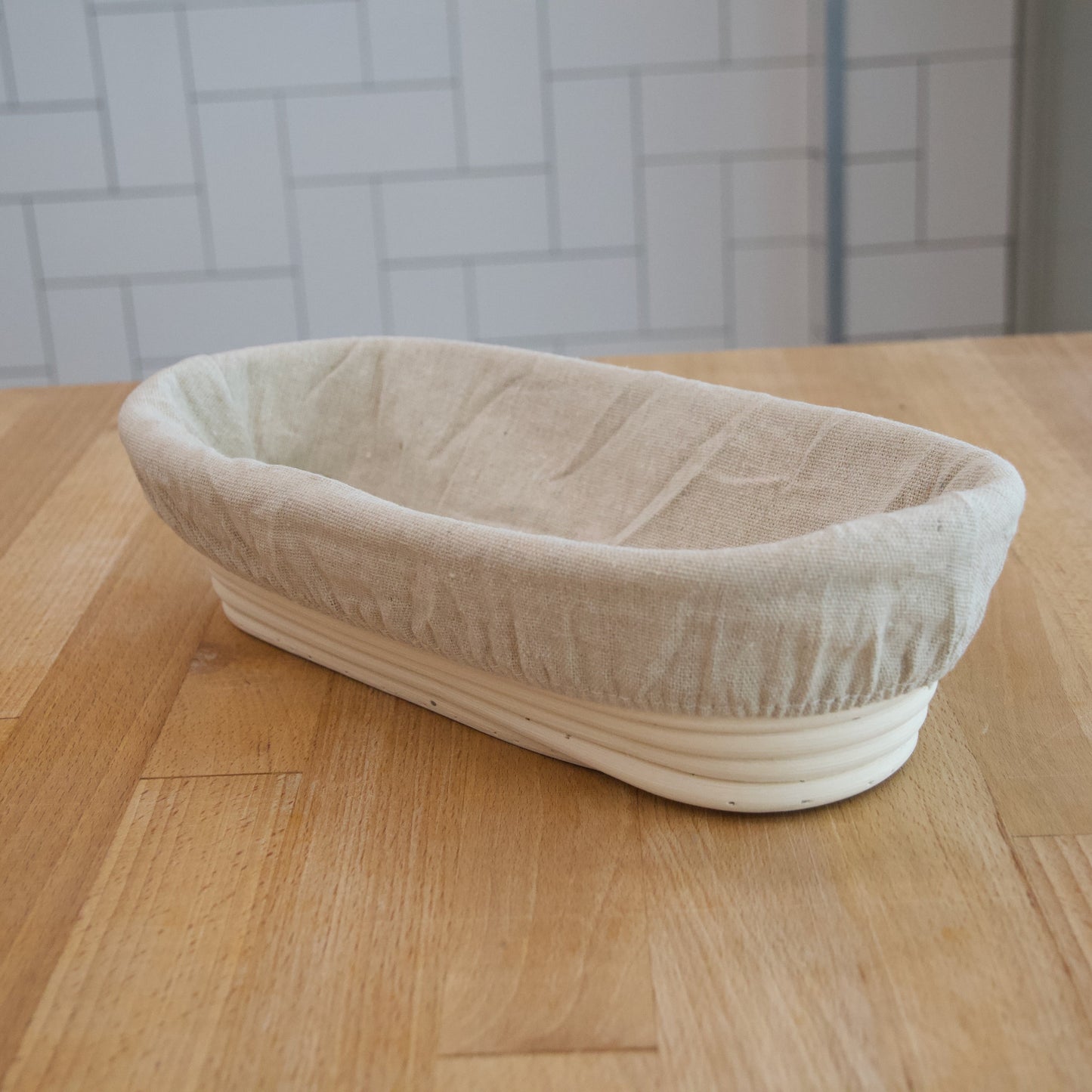 Ovaal rijsmandje met linnen liner